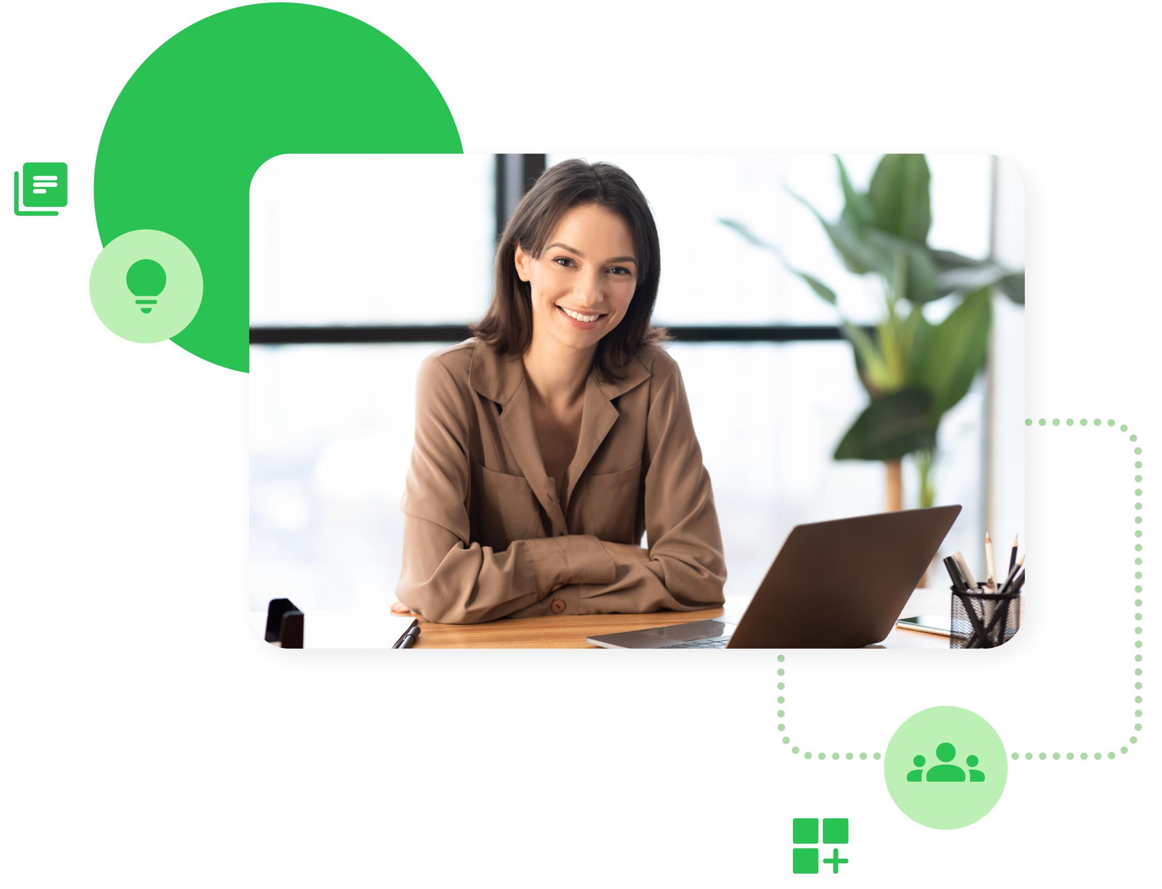 Smiling business woman sitting at desk with laptop
